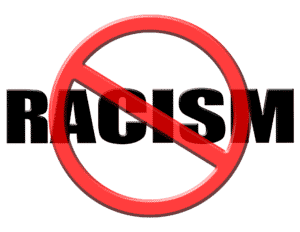 A red circle with a line through it over top of the word Racism