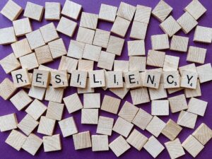 Scrabble tiles that spell out resilience