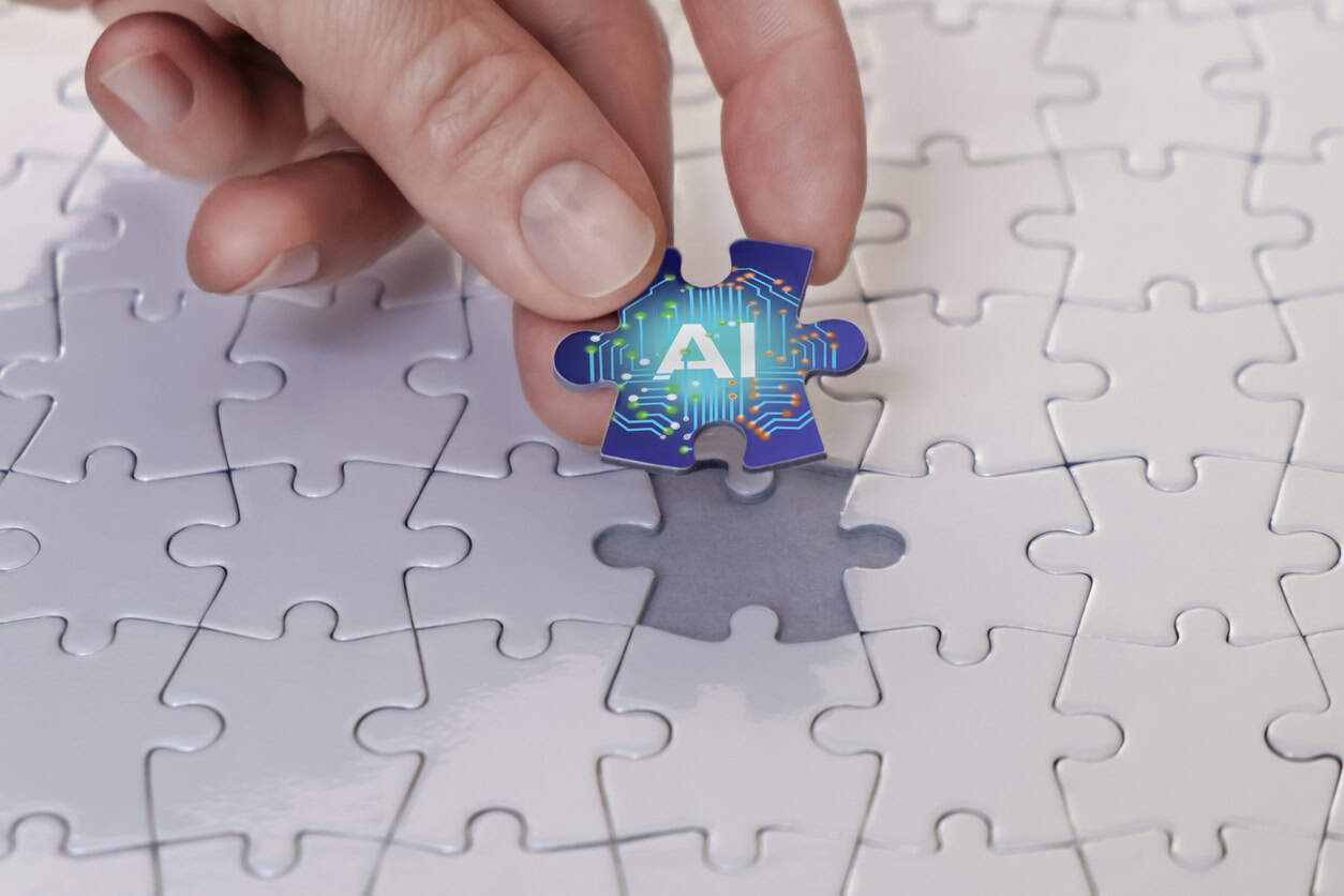 The businesswoman places the last piece of the puzzle, the concept of artificial intelligence.