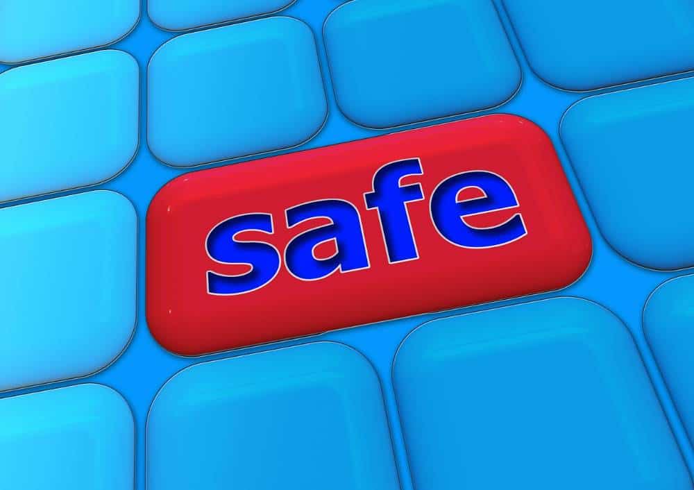 Keyboard with red key that says safe